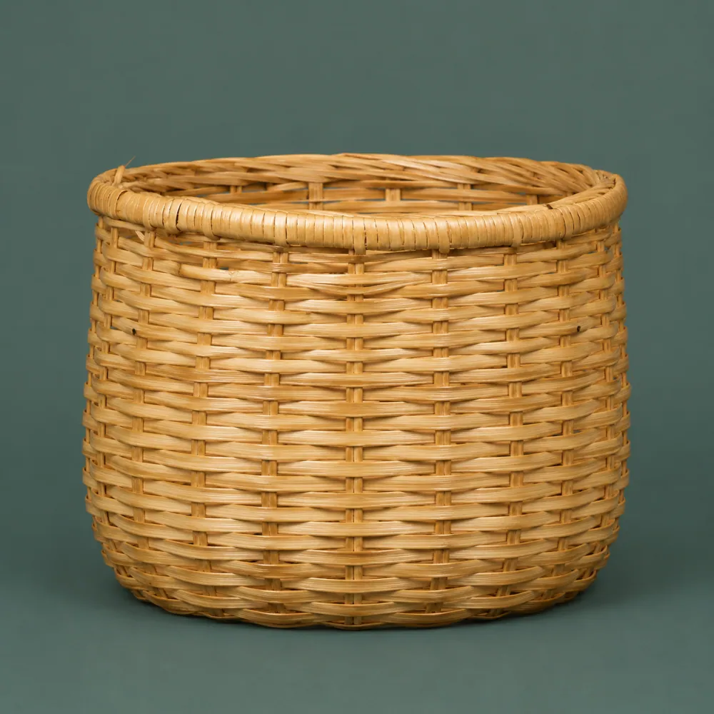 Round Basket 280, piece ON-A-02, woven in Rattan, photographed as it is.