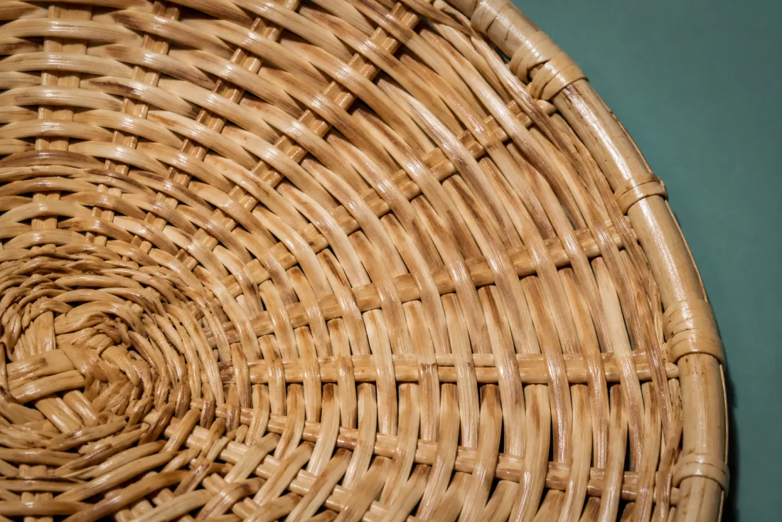 The weave and rim of ON-A-01 in close-up. Weave starts at the base centre and runs anticlockwise; the closing stake sits at the four-o’clock position on the rim.