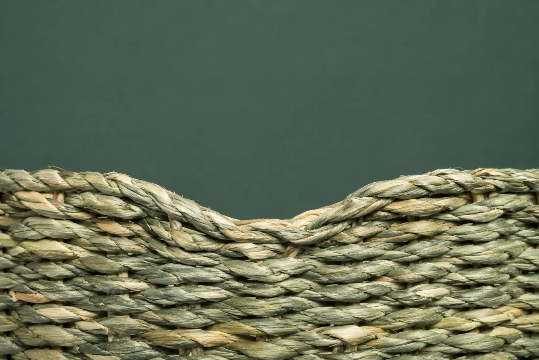 The visible flaw on ON-A-07: The rim dips 5 mm over the front arc. Three cord ends are visible on the underside where lengths were joined.
