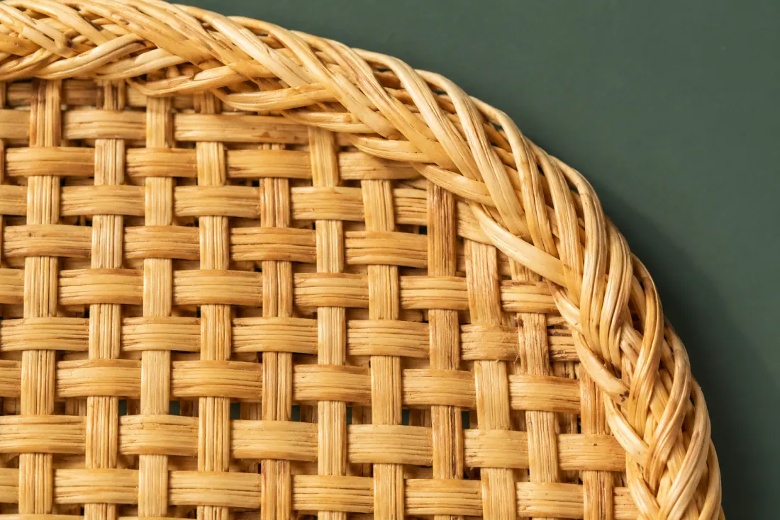 The weave and rim of ON-B-01 in close-up. Woven from an eight-point cross; the closing stake sits at twelve o’clock under the border.