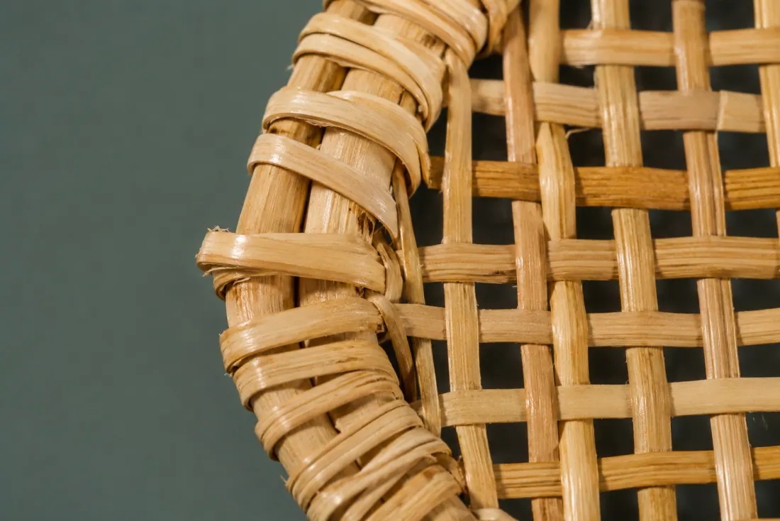 The visible flaw on ON-B-03: A 30 mm section of the border is bound more loosely than the rest, on the left. One cane has split lengthwise for 8 mm near the rim.