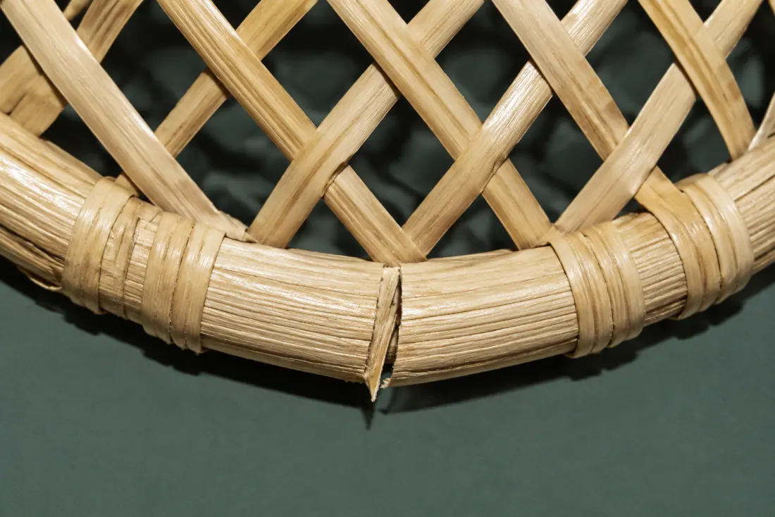 The visible flaw on ON-C-01: A cane has split for 9 mm just above the lower edge at the back. The top aperture is 2 mm oval.