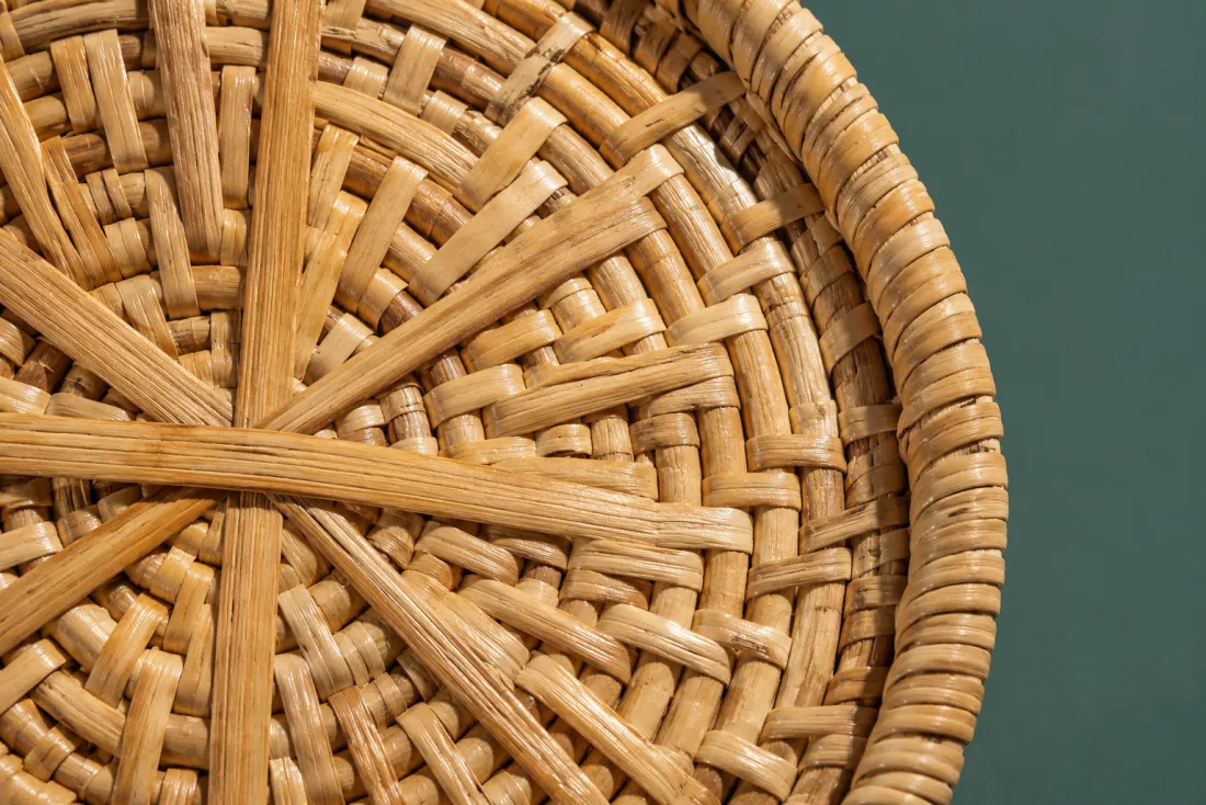 The weave and rim of ON-D-02 in close-up. Ten-point cross worked in the opposite hand to its pair; the closing stake sits at eight o’clock.