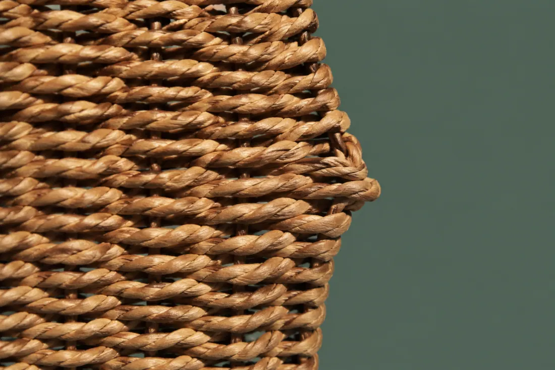 The visible flaw on ON-D-09: The right edge bows outward by 6 mm at mid height. A 25 mm scuff has taken the skin off one weft near the centre.