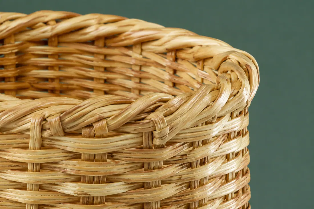 The weave and rim of ON-F-05 in close-up. Woven up from a four-point base; the closing stake meets the rim at the back.